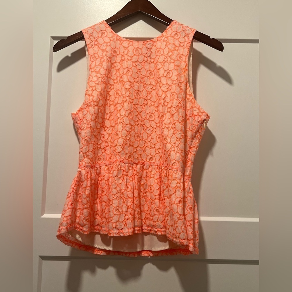 Vibrant Orange Peplum Sleeveless Top